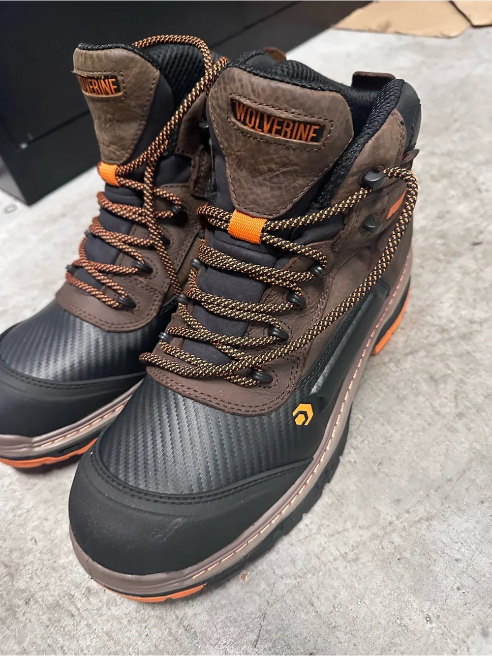 Wolverine Black and Brown Steel toe Work Boots with Orange Accents